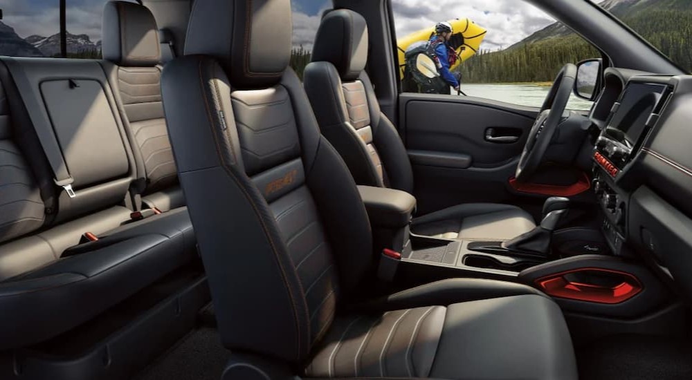 The black interior in a 2025 Nissan Frontier.