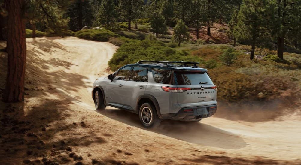 A gray 2025 Nissan Pathfinder driving off-road.