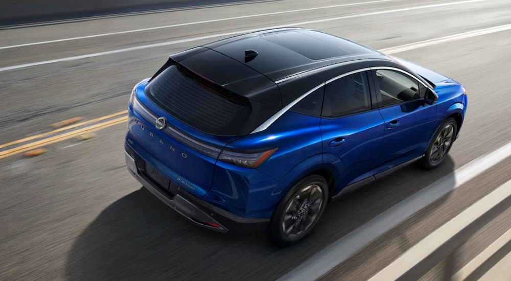 Rear view of a blue 2025 Nissan Murano for sale