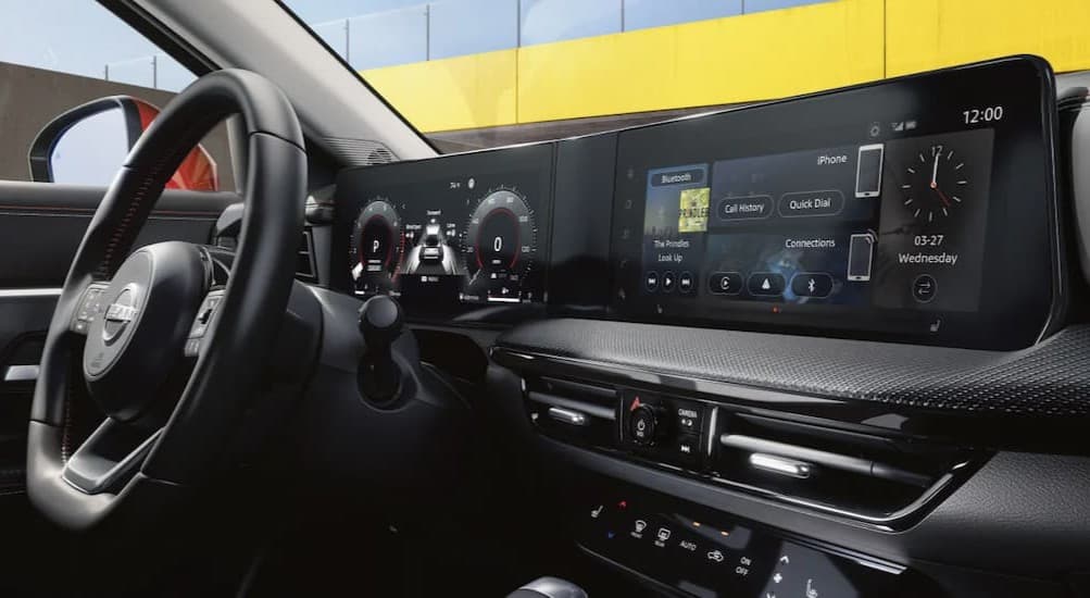 Black dash in a 2026 Nissan Kicks for sale in Brooklyn Park.