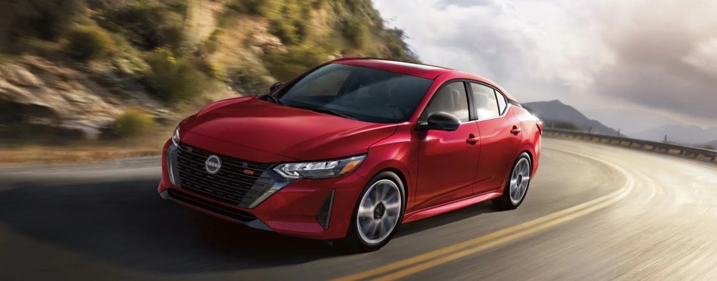 a red 2025 Nissan Sentra SR is shown from the front at an angle.